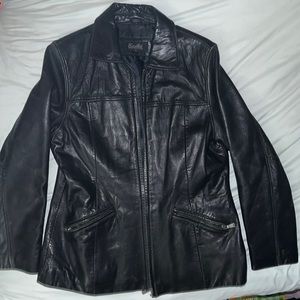 Womens genuine leather jacket with polyester lining.